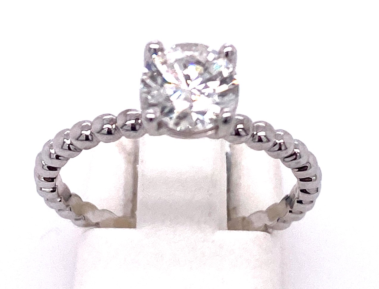 18KW 1.01CT RBC DIA G/I1 W/ PEEKABOO SOL RING
