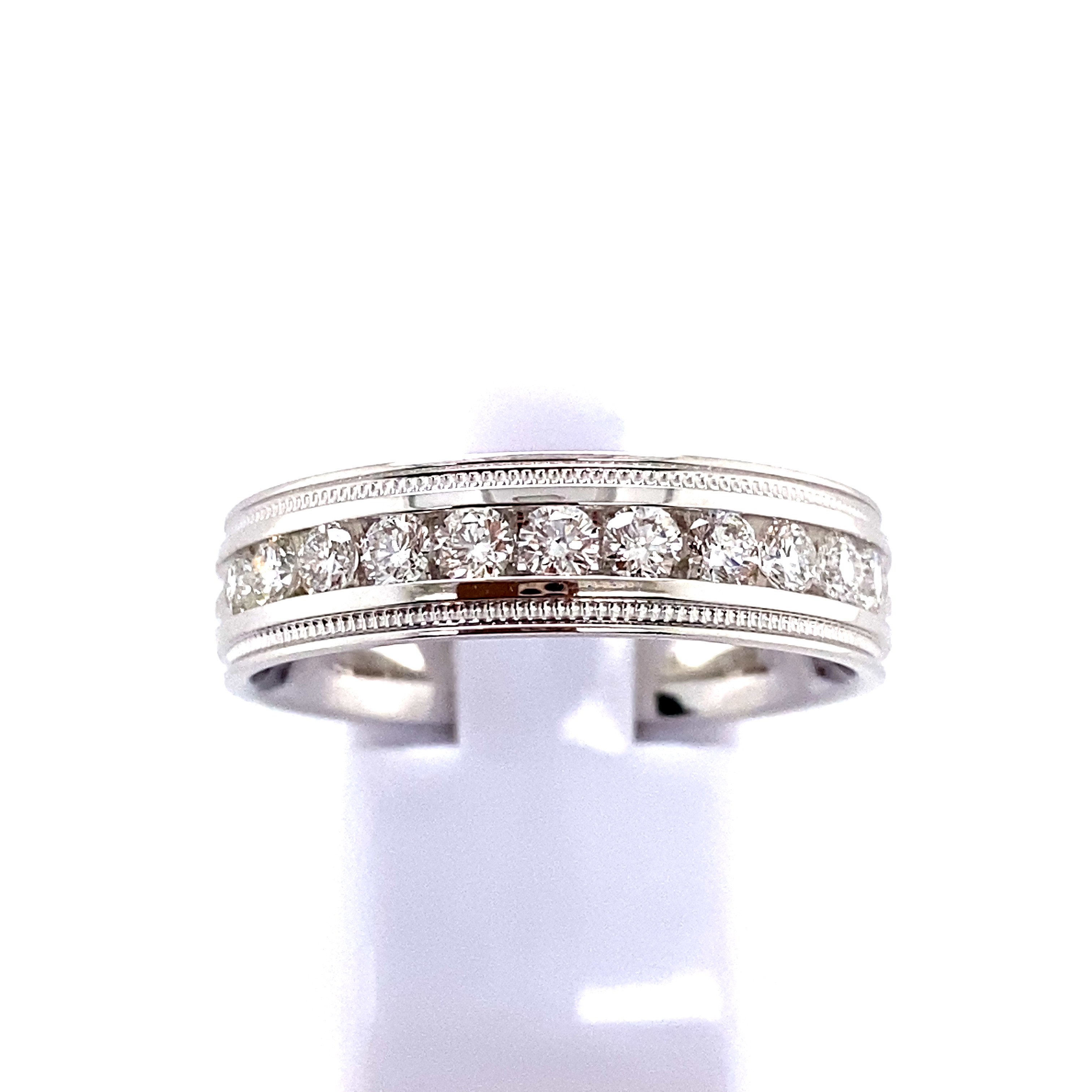 18KW .77CTW DIA 1/2 WAY ENGRAV CHANL MENS RING