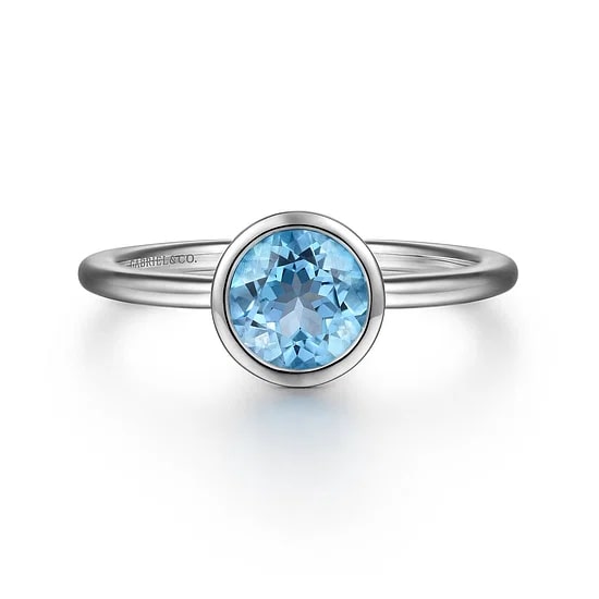 SS .99CT SWSS BLUE TOPAZ BEZEL RING SZ 6.5
